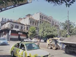 ساحة برج الروس وفي الصدر بناية سابا صعبية وبجانبها على الزاوية بناء احد القناصل عام 1913