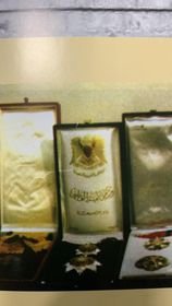 جانب من الاوسمة التي نالها البطريرك الياس