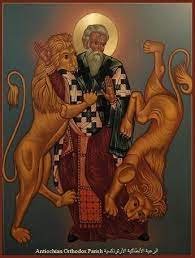 القديس اغناطيوس المتوشح بالله شهيدا عندما افترسته الاسود في روما