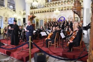 متحدثا بالتناوب مع الاب يوحنا اللاطي في هذه الاحتفالية