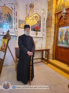 رئيس الدير الارشمندريت يوحنا التلي